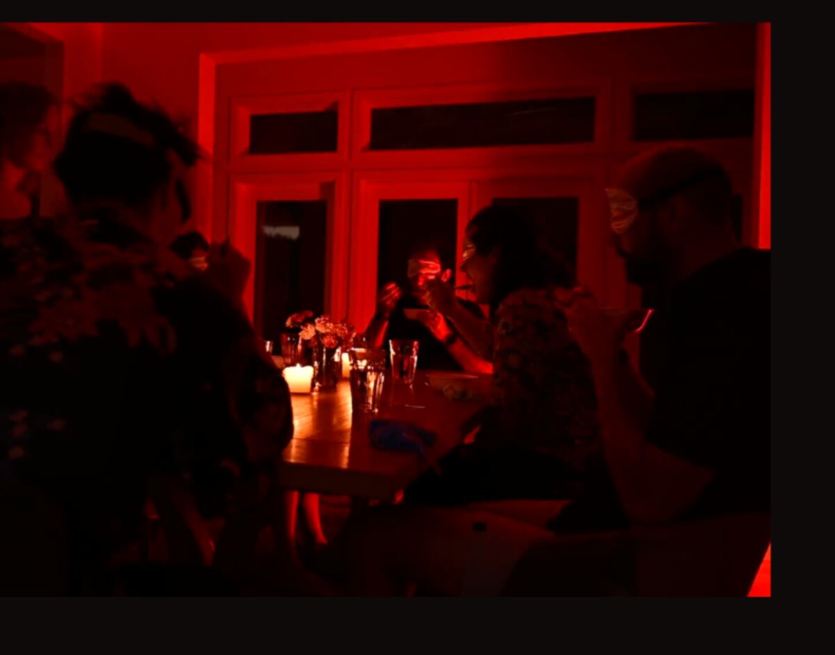 Guests around the table mid-experience