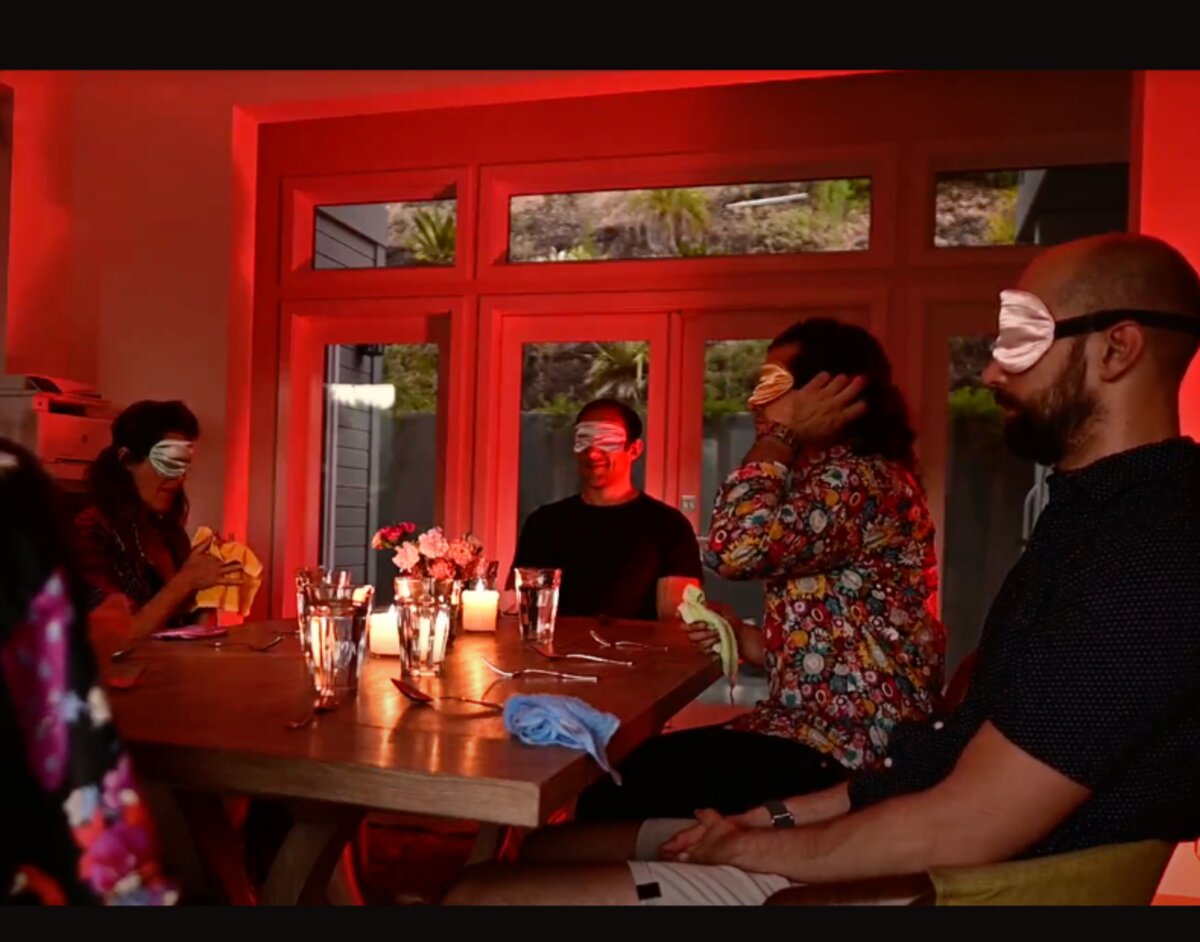 Guests in the warm, dim dining room
